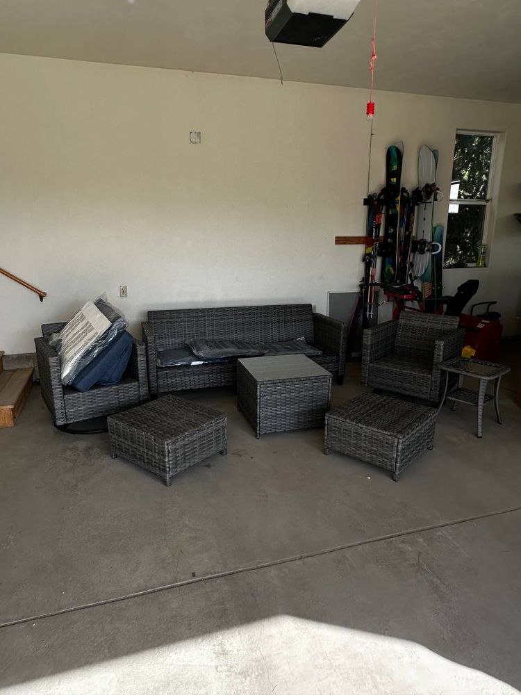Fully assembled gray wicker patio set — sofa, chairs, ottomans and table — furniture assembly in Denver